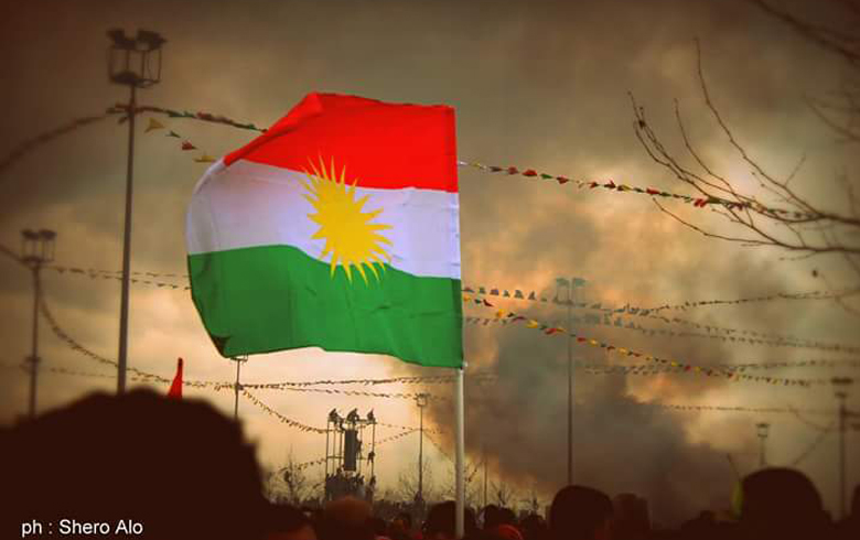 The presence of the Kurdish flag on a Kurdish cellphone causes him to be arrested and tortured