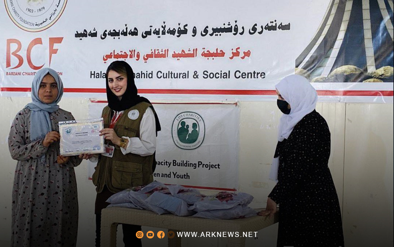 Certificates and prizes for participants in a sewing course organized by Barzani Charity in Darshukran and Dibeka camps