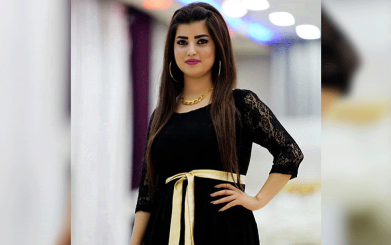 Artist Dilma Sofi commemorates the Kurdish flag day in Kawergosik camp