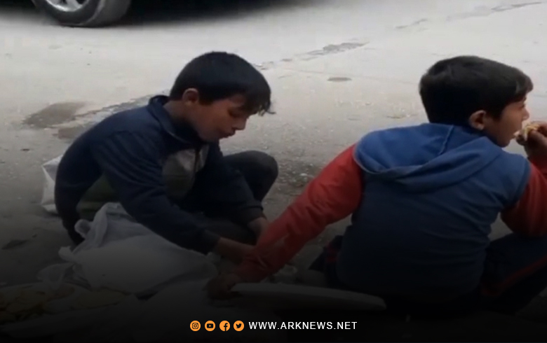 Al-Hasaka... The poor living situation forces children to eat from garbage