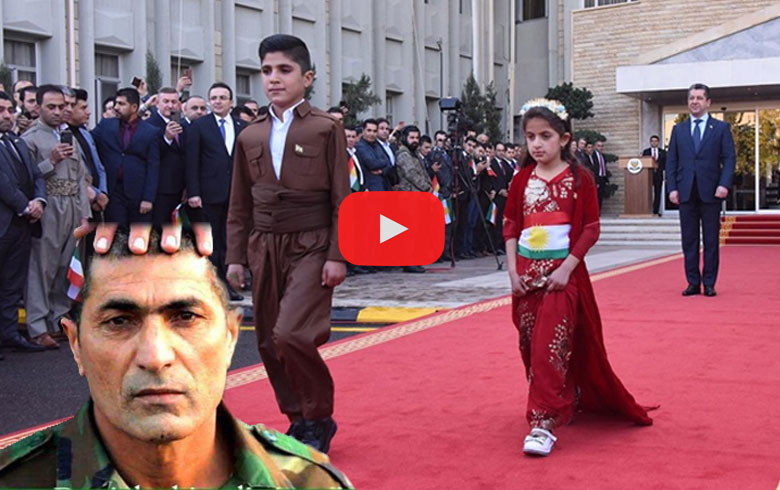 Children of fallen Peshmerga hoist Kurdistan flag at Erbil ceremony