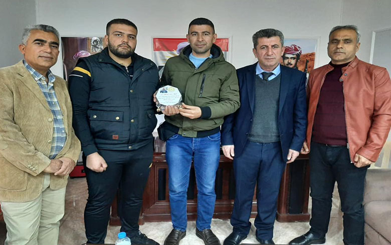 The official of Roj organization of the PDK-S honor the hero Hassan Mustafa Hassan