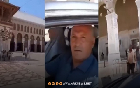 شخص يتجول بسيارته في باحة الجامع الأموي بدمشق 