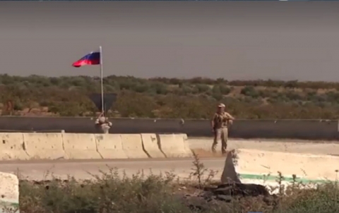 Russian police set up a checkpoint near the Turkish post east of Morik in Hama countryside