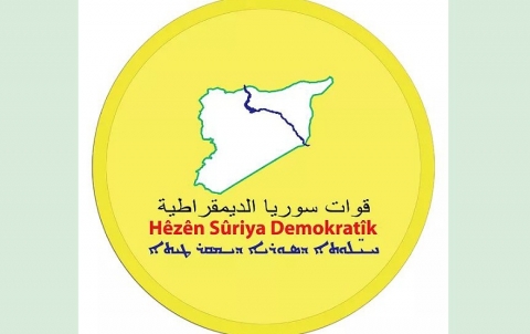Who is the leader in SDF who was arrested by the coalition for financing ISIS?