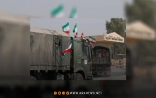 Iranian militias enter a military convoy into Syrian territory
