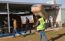 The UAE Red Crescent in coordination with the Barzani Charity Foundation distribute winter needs in the camp of Qushtapa